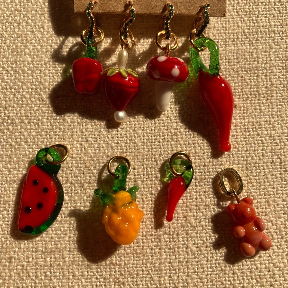 Gold plated earrings with hand made glass charms.